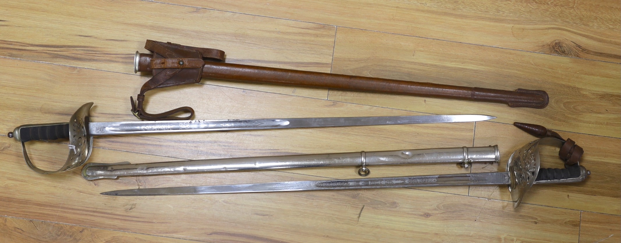 Two George V infantry officer's swords, 100cms long.